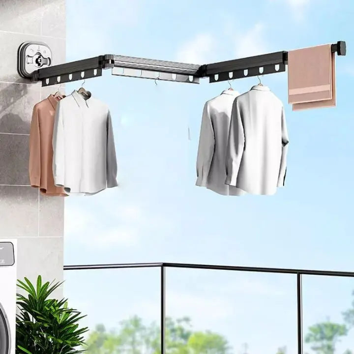Wall-mounted foldable clothes drying rack with suction cups