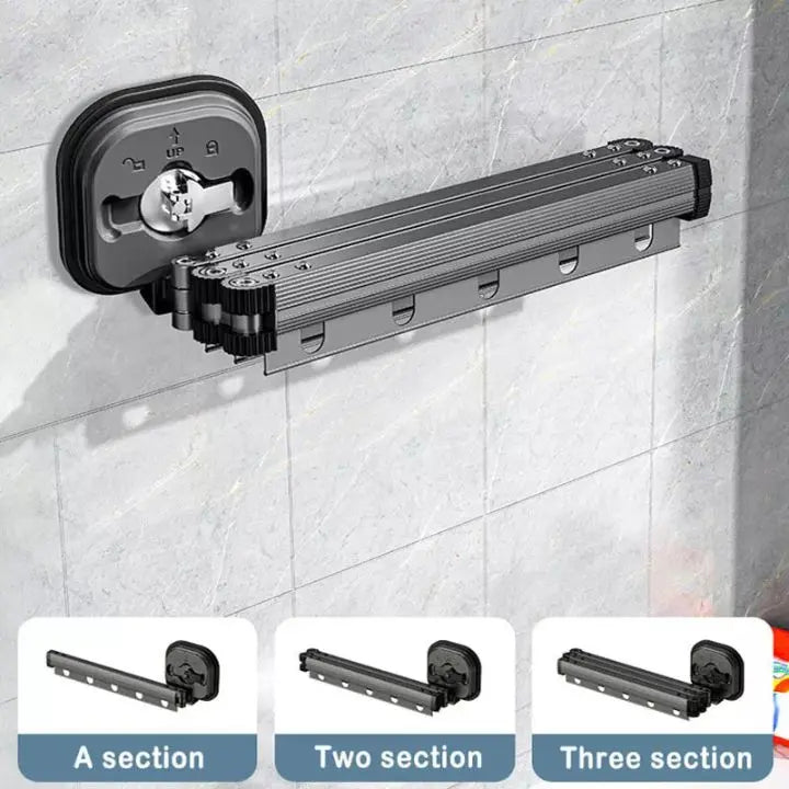Wall-mounted foldable clothes drying rack with suction cups