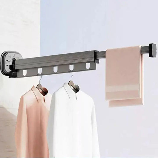 Wall-mounted foldable clothes drying rack with suction cups